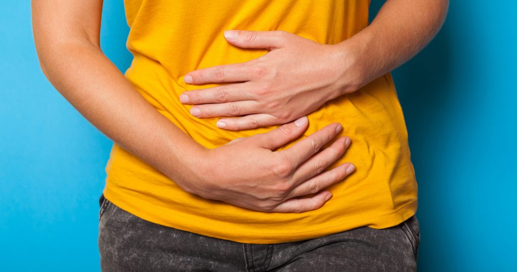 UFE-bellypain-yellowshirt